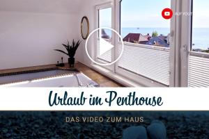 希尔克道夫Große Penthouse Ferienwohnung mit Meerblick, Sonnenterrasse & Luxusbad - Nur 50 Meter zum Strand的海景阳台的照片