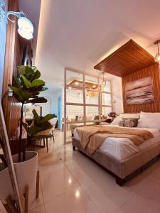 曼达维市Queen Size Studio in Cebu City的一间卧室,卧室内配有一张大床