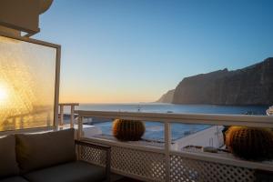 阿坎提拉德洛斯基Vistas soñadas cerca del mar的客房设有海景阳台。