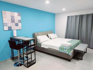 Apricity Suites Aruba客房内的一张或多张床位