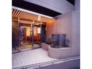 东京Hotel Business Villa Omori - Vacation STAY 08202v的旁边设有电视的建筑