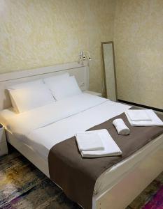 Hotel Sonata客房内的一张或多张床位