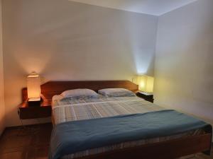 圣塞巴斯蒂安Green Toque-Toque的一间卧室配有两张单人床。