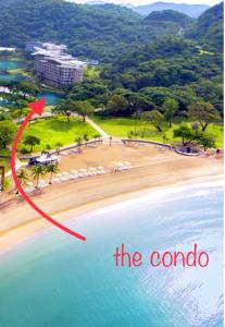 纳苏格布Pico de Loro Miranda Family Beach Condo max 6 pax with fiber internet的红箭头的海滩空中景色