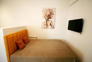 Apartment Maison Dorcol 3客房内的一张或多张床位