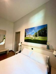 Best Quality Hotel Dock Milano客房内的一张或多张床位