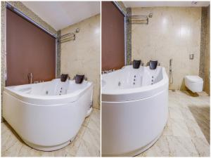 卡兰古特Grandeur De Sanchi- Luxury Beach Resort & Spa的浴室两张图片,配有浴缸和卫生间