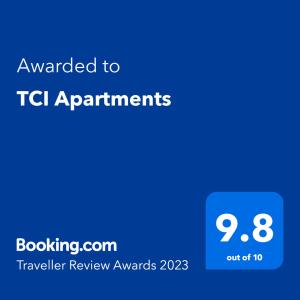 克卢日-纳波卡TCI Apartments的蓝色的屏幕,文字被授予icl约会