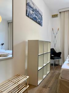 Pinzolo DOLOMIA apartment的电视和/或娱乐中心