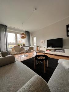 萨尔路易斯Angie´s Home的带沙发和平面电视的客厅