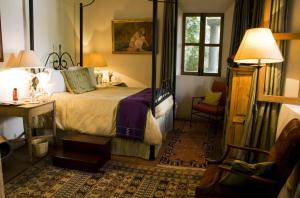 圣米格尔米西翁酒店客房内的一张或多张床位