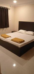 OYO Hotel Swagat Inn客房内的一张或多张床位