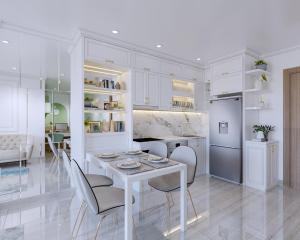 河内Lu Luxury Homestay et Apartment - Vinhomes Smart City Hanoi的白色的厨房配有白色的桌子和椅子