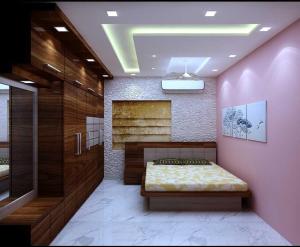 巴特那Flagship Hotel Sweta Villa的卧室配有一张粉红色墙壁上的床铺