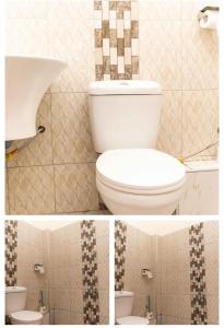 Langata RongaiSpringStone apartment 1 bedroom no 5的浴室配有白色卫生间和盥洗盆。