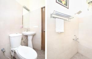 齐拉克普尔Hotel Sunkriti Resort的一间带卫生间和水槽的浴室