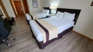 阿里卡迭戈德阿尔马格罗阿里卡酒店的酒店客房设有两张床和电视。