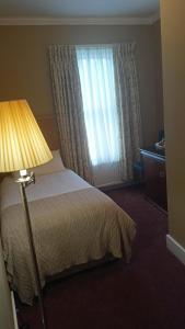 赛古酒店客房内的一张或多张床位