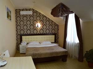 Rostov Hotel客房内的一张或多张床位