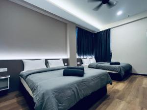 LAVIE HOTEL & APARTMENT客房内的一张或多张床位