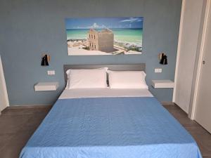 阿格里真托B&B Gergent的一间卧室配有一张壁画床