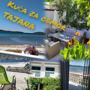 克拉帕尼岛Kuća za odmor TAJANA的从度假村的阳台上可欣赏到海滩景色