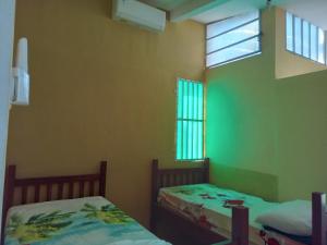 Dannu's Homestay & Ijen, Bromo, Meru Betiri Sukomade Tours客房内的一张或多张床位