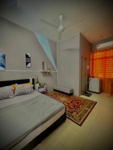 AD Homestay Gua Musang Terrace House with 3 room客房内的一张或多张床位
