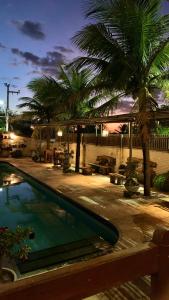 卡诺格布拉达蝴蝶旅馆的庭院内棕榈树游泳池