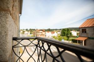 阿罗萨新镇O Legado de Ramira的阳台享有城市美景。