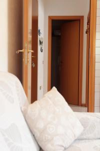 Appartamento l'edera客房内的一张或多张床位