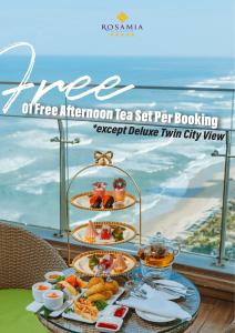岘港Rosamia Da Nang Hotel的每次预订可享用免费下午茶套餐,享有美丽的豪华小城市景观