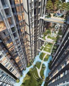 吉隆坡Duplex M-City ampang klcc by Mint的两栋建筑之间河流的空中景观