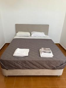 Madoupa Beach Apartments客房内的一张或多张床位