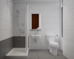 杜塞尔多夫Antares Apartments的浴室配有卫生间、盥洗盆和淋浴。