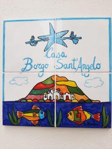 伊斯基亚Casa Borgo Sant'Angelo的波卡海滩海湾角标志