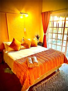 Kruger River View客房内的一张或多张床位