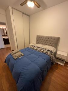 Dos ambientes en Caballito客房内的一张或多张床位