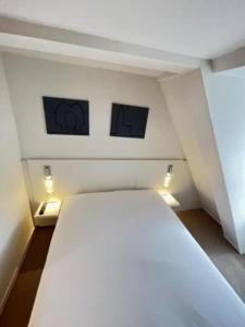Residence OLit Cathédrale客房内的一张或多张床位