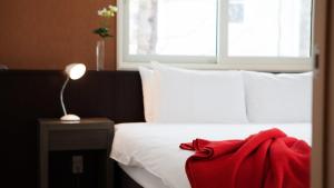 丰市区别墅酒店客房内的一张或多张床位
