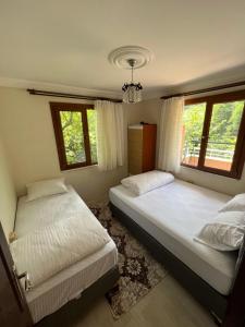 Yeşil Doğa Tatil Apart客房内的一张或多张床位