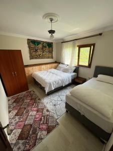 Yeşil Doğa Tatil Apart客房内的一张或多张床位