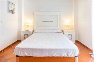 TORRE DEL MAR - ALMaYATE客房内的一张或多张床位