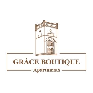 萨勒河畔哈雷Grâce Boutique Apartments的建筑塔楼图,带有车库精品公寓