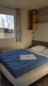 贝吉里宿营地客房内的一张或多张床位
