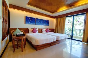 蔻立Khaolak Orchid Beach Resort - SHA Extra Plus的相册照片