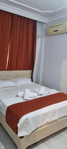 Konyaaltı Apart Hotel客房内的一张或多张床位
