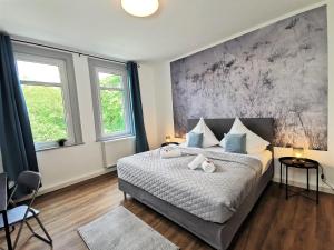 BohnApartments Deluxe-Zechen-House-Family - 2 Balkone - gratis Parkplätze - WLAN客房内的一张或多张床位