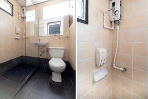 莱卡邦Plai And Herbs Suvarnabhumi Airport的一间带卫生间和水槽的浴室
