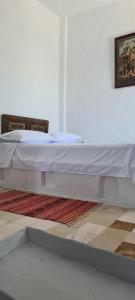 Dar Michèle Djerba客房内的一张或多张床位